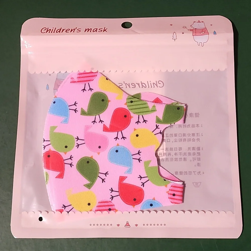 Children's re Usable face mask new in package never opened